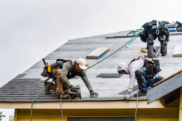 Professional Gutter Installation technician working in Woodsfield, OH